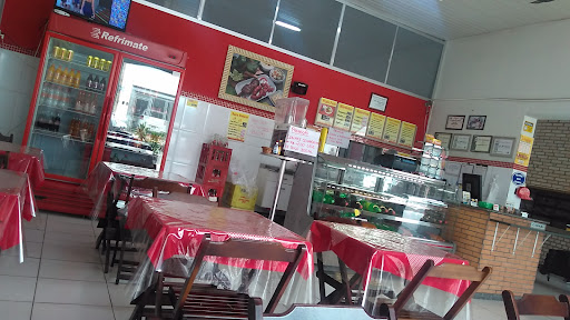 O Assador Frango na Brasa